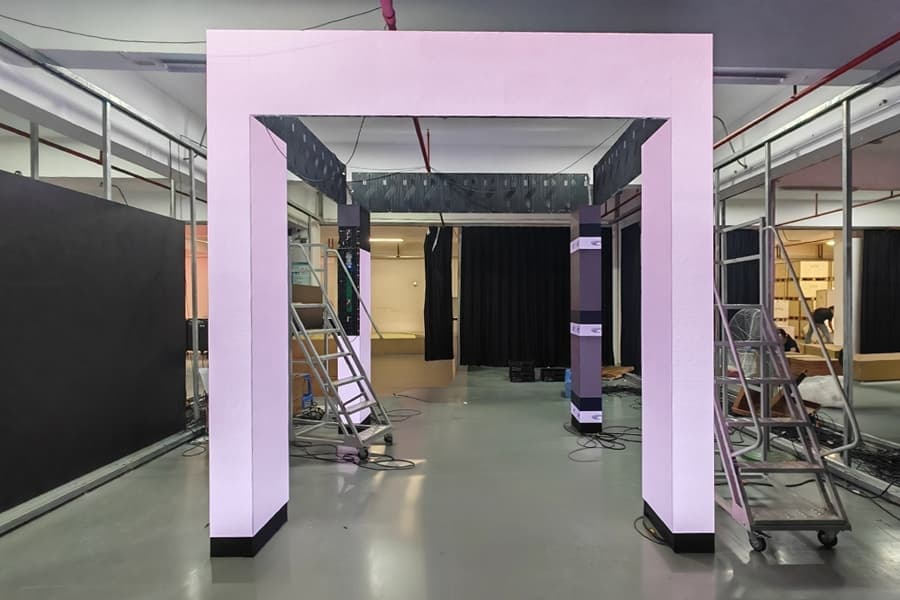 Indoor 3D frame LED display installed in shopping mall atrium, showing vibrant promotions and attracting customer traffic